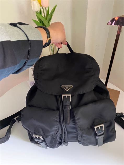 real leather sling backpack prada|real real prada backpack.